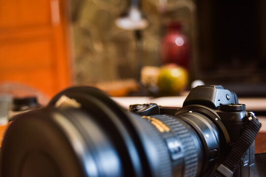 Modern digital camera close up. Shot with shallow depth of field creating blurry foreground and background