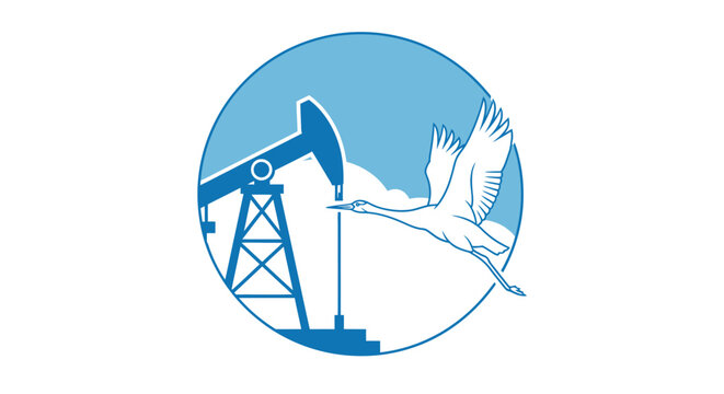 Oil pump jack silhouette with flying crane bird contrast.