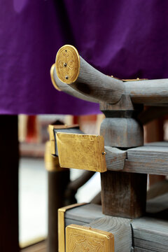 Gold metal decorative ornaments on wooden shrine structure at Kamigamo shrine, Kyoto, Japan