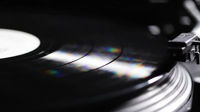 Close up of a vinyl record playing on a turntable