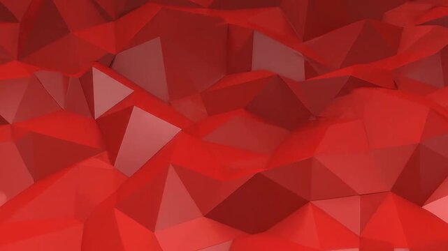 A vibrant red geometric background with sharp triangular facets