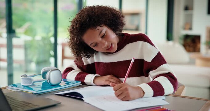 Writing, thinking and child in house with homework for elearning, online class or education with laptop. Notes, counting and girl student with computer for quiz or test on mathematics in apartment.