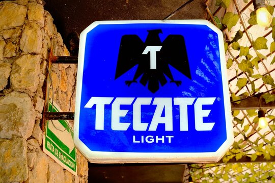 Tecate Light Beer Sign in Tropical Restaurant (Tamasopo, San Luis Potosi, Mexico &ndash; May 15, 2026)