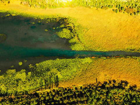 Aerial view of the confluence where the Cikola river lake drom torak view tributary joins the Krka river canyon, Krka National Park, Dalmatia, Croatia.