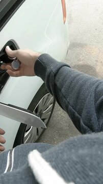 Person POV filling the diesel car tank