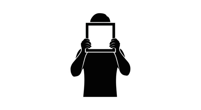 Silhouette of a person holding up a blank frame against a white background, creating a mysterious mood.
