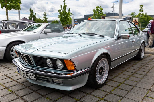 Leipzig, Germany - 9 May, 2026. Classic BMW 6 Series e24 coupe parked during automotive gathering chrome details elegant silver bodywork. Vintage luxury automobile iconic styling retro vehicle