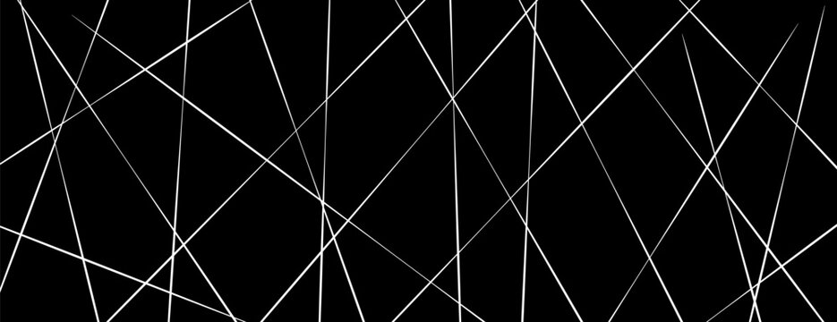 Straight chaotic random lines background. Intersecting white lines on a black background