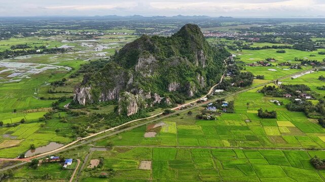 railway through rice fields in Kampot - Cambodia