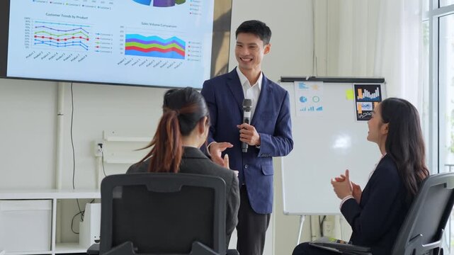 Business people applauding successful corporate presentation seminar