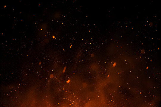 Fiery sparks and embers against a dark black background abstract fire particles