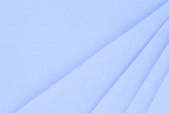backdrop for message: light blue crepe paper folded several times