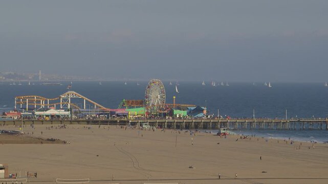 Santa Monica pier and roller coaster on the beach