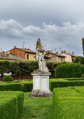 Obraz premium Park with statue in San Quirico d’Orcia, Tuscany, Italy