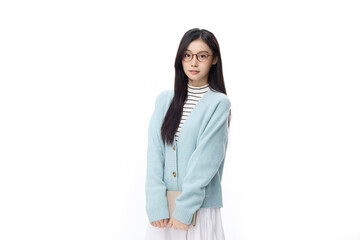 Fototapeta premium Young Woman in Glasses Wearing Blue Cardigan