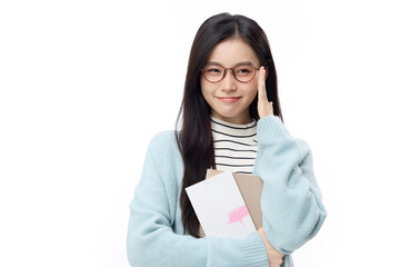 Fototapeta premium Smiling Young Female Student Holding Notebooks