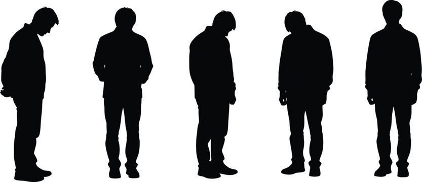 Sad and depressed man silhouettes standing in various positions representing grief loneliness or regret