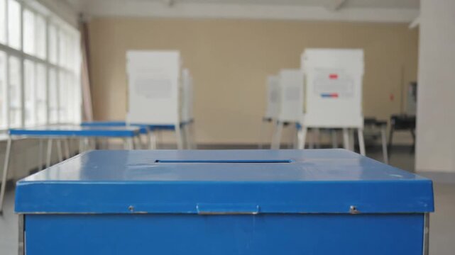 Putting the vote in a ballot box.