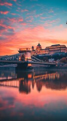Obraz premium Budapest chain bridge at sunset hungarian parliament reflection on danube river