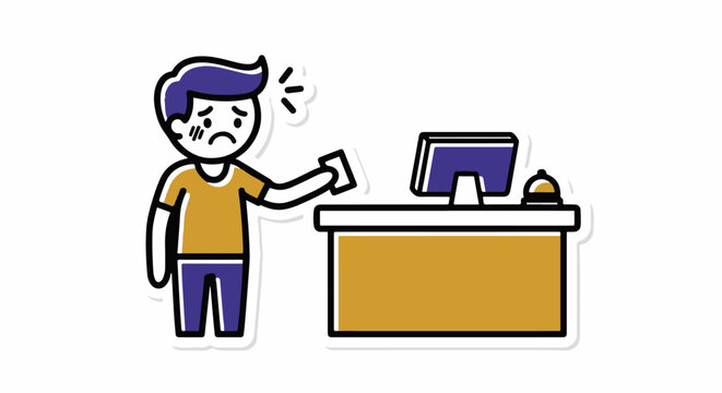 Frustrated young man hitting desk near computer.