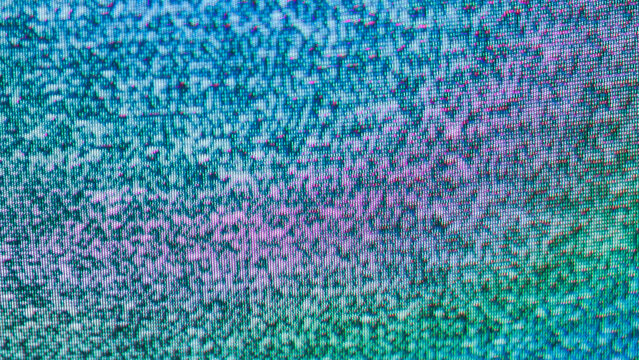 Crt tv static with green teal and pink purple blotchy color patches on pixel screen
