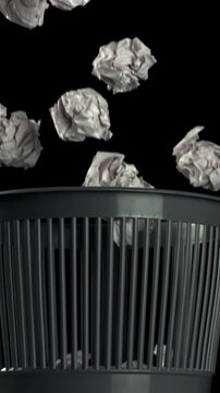 Crumpled paper falls into the trash can. Filmed on a high-speed camera at 1000 fps. High quality FullHD footage
