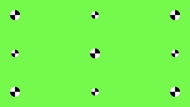Professional greenscreen setup with tracking points and motion markers for seamless chroma key compositing in cinema and television post-production.