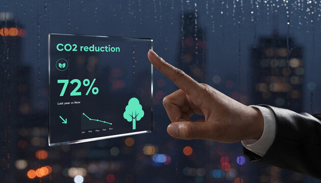 Person interacting with digital interface displaying co 2 reduction information