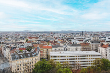 Obraz premium Vienna cityscape panorama with historic red rooftops and urban skyline view 