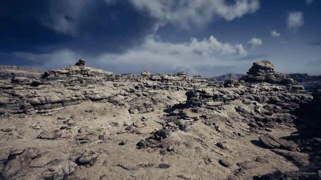 golden hour rocks bathed in warm light, glowing sandstone edges, long shadows across textured ground, tranquil evening mood for travel imagery