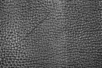Fototapeta premium Dark black leather texture with fine grain surface and realistic material background