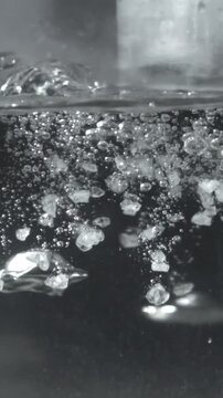 The cook salts the water in a saucepan. Filmed on a high-speed camera at 1000 fps. High quality FullHD footage