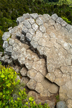 Looking down on volcanic basalt rock columns.