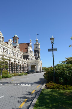 Road in front of early 20th century building with Flemish Renaissance style edifice