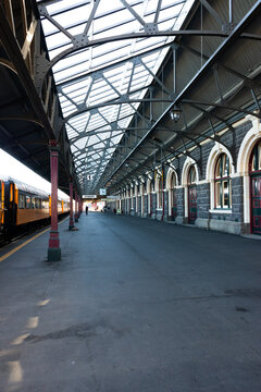 View along a train station with train