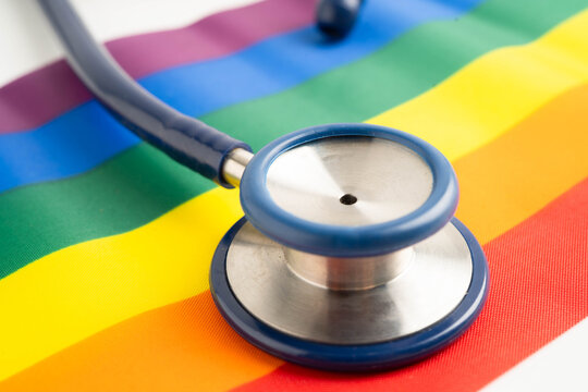 Stethoscope on LGBT rainbow flag, rights and gender equality.