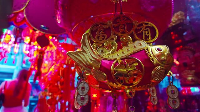 Decorative lantern with golden fish and fortune charms inside Manila Chinatown