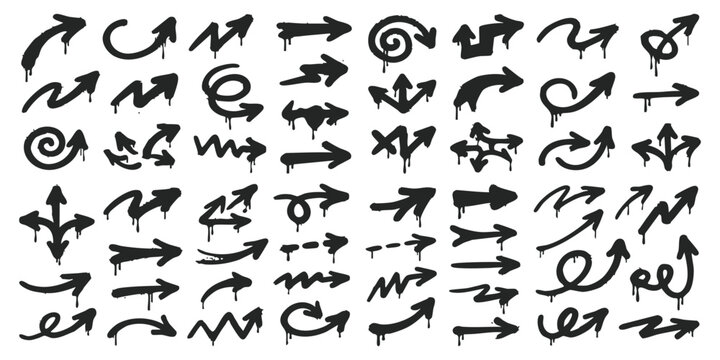 Set of hand drawn graffiti arrows with spray paint drip texture in black ink for urban street art design elements