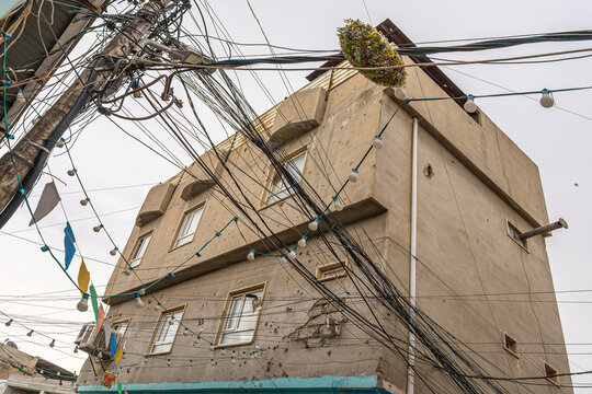Massive Tangle of cables and wires in the city of old Mosul, Iraq
