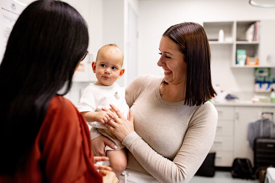 A mother brings her baby for a routine check‑up, building trust with their doctor