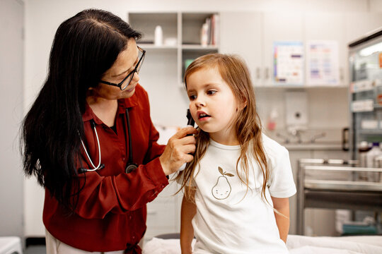 Young child behaving at the ear specialist