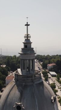 Vertical aerial orbit around the dome of the Sanctuary of Our Lady of Sameiro in Braga, Portugal.