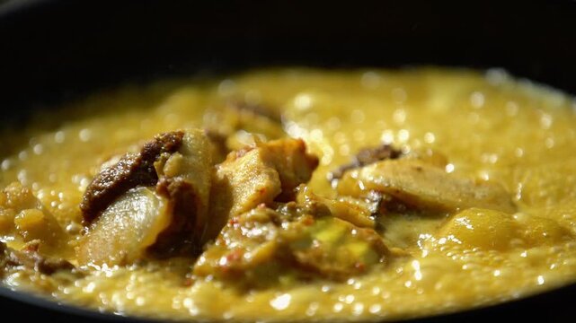 Delicious Chicken Curry Simmering in a Pan Ready to Serve.