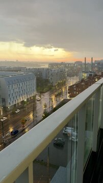 Vertical cinematic Twilight Rainy View over Helsinki J&auml;tk&auml;saari Rooftops toward Baltic Sea on Rainy Spring Evening