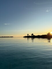 Fototapeta premium Tropical morning on Maldives island with golden sunlight