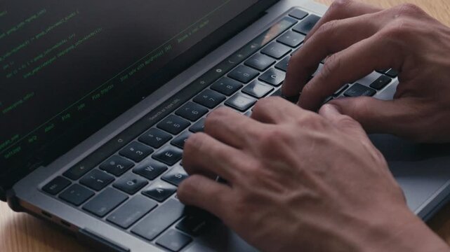 Close-up of a person typing on a laptop, showing online work, digital communication, remote working, productivity, and modern office lifestyle.