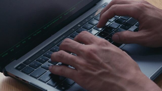 Close-up of a person typing on a laptop, showing online work, digital communication, remote working, productivity, and modern office lifestyle.