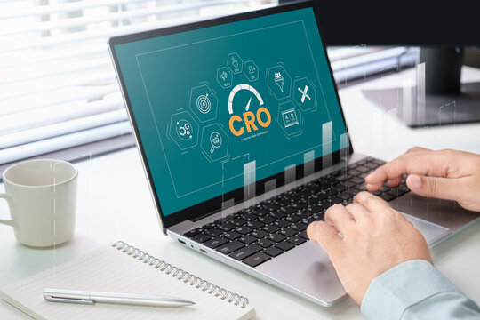 Business professional using CRO conversion rate optimization dashboard on laptop screen, digital marketing analytics interface, A/B testing metrics, performance tracking, business growth strategy