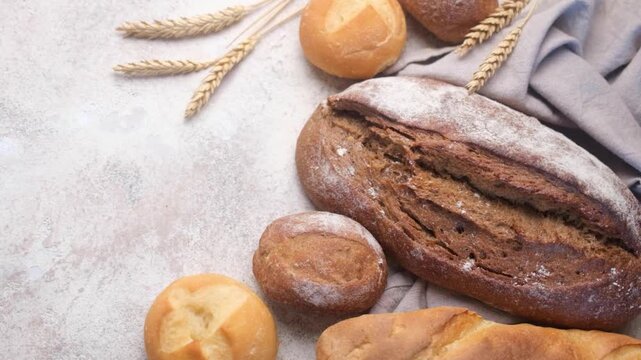 Assortment of fresh baked bread with wheat ears