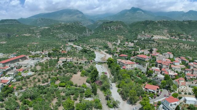 Aerial View of Kardamyli Village, Turquoise Sea, Olive Groves and Mountain Landscape on the Mani Peninsula, Peloponnese, Greece